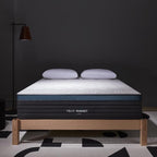 Helix Sunset mattress on a wooden bed frame with a dark wall background